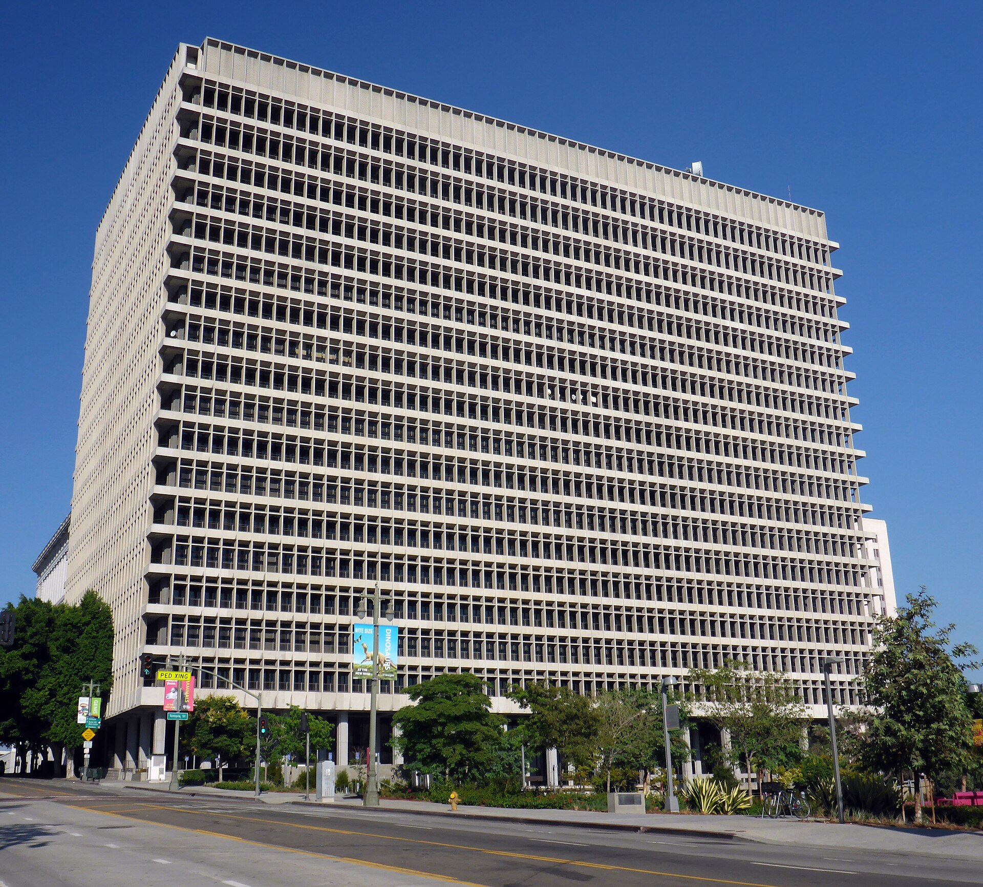 Grid-like exterior of the Clara Shortridge Foltz Criminal Justice Center in downtown Los Angeles under a clear sky.